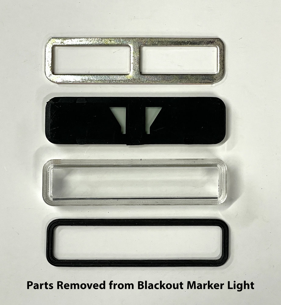 parts-removed-from-blackout-marker-light-slot.jpg