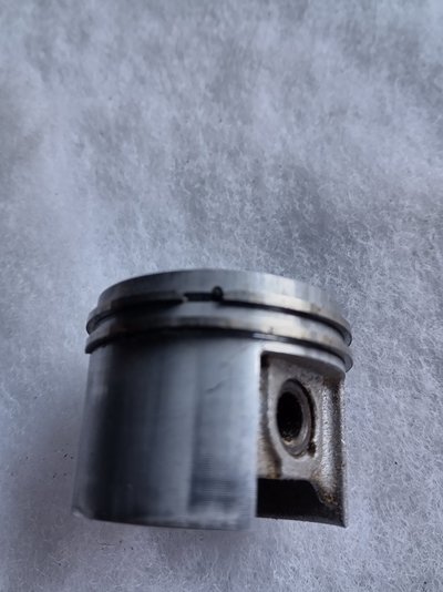 MS180 piston carbon.jpg